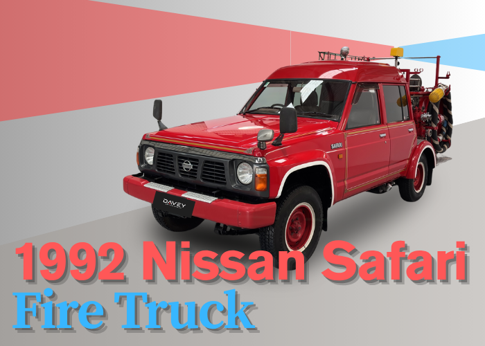 Shows Nissan Safari with Emergency lights active