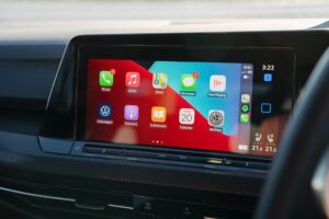 Touch screen in car, showing an Apple CarPlay System. 